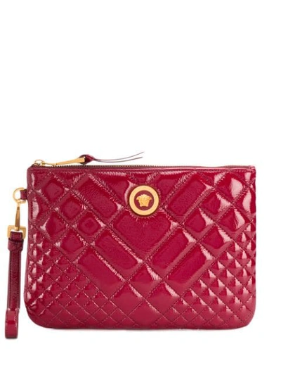 Shop Versace Quilted Medusa Logo Clutch In Red
