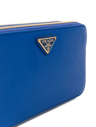 Shop Prada Logo Plaque Cross-body Bag In Blue