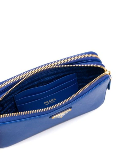 Shop Prada Logo Plaque Cross-body Bag In Blue