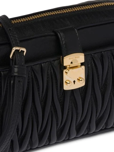 Shop Miu Miu Matelassé Leather Mini-bag In Black