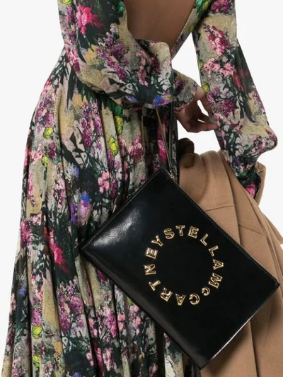 Shop Stella Mccartney Stella Logo Clutch Bag In Black