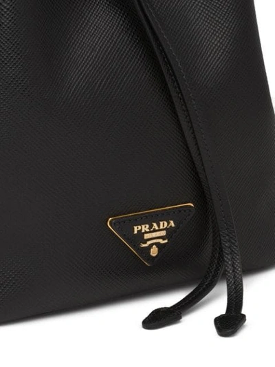 Shop Prada Saffiano Bucket Bag In Black