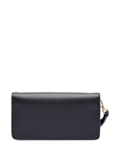 Shop Prada Saffiano Logo Plaque Mini Bag In Black