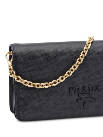 Shop Prada Saffiano Logo Plaque Mini Bag In Black
