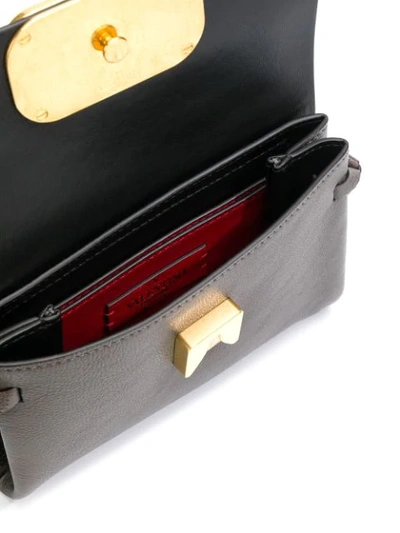 Shop Valentino Garavani Vring Belt Bag In Brown