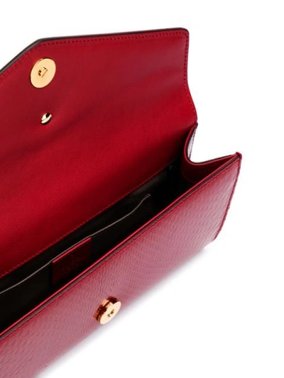 Shop Gucci Gg Marmont Clutch In Red