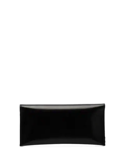 Shop Saint Laurent Monogram Quilted Clutch In Black
