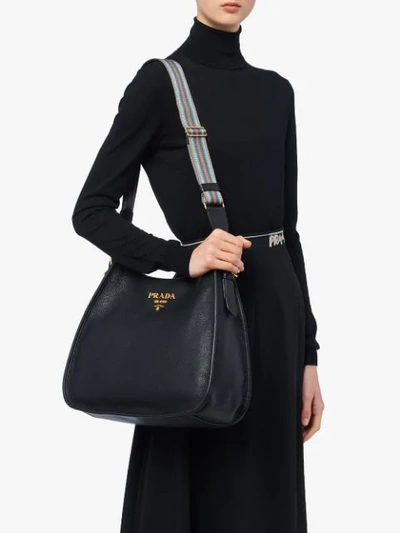 Shop Prada Front Logo Hobo Bag In Black