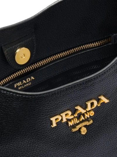 Shop Prada Front Logo Hobo Bag In Black