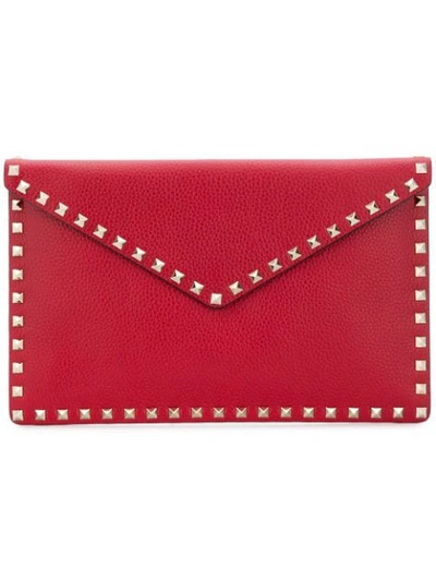 Shop Valentino Garavani Rockstud Envelope Clutch In Red