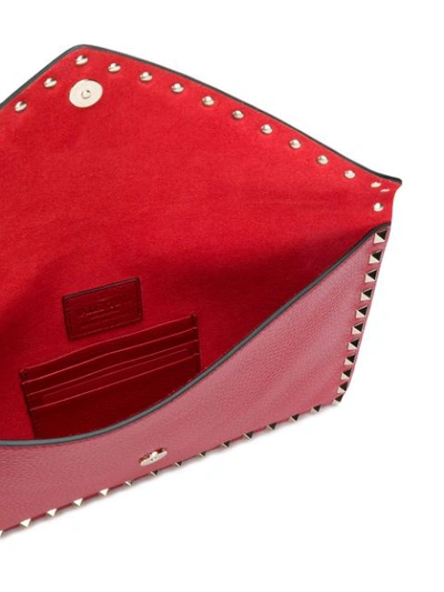 Shop Valentino Garavani Rockstud Envelope Clutch In Red