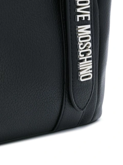 Shop Love Moschino Dual-buckle Backpack In Black