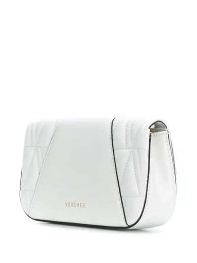 Shop Versace Logo Plaque Cross-body Bag In White