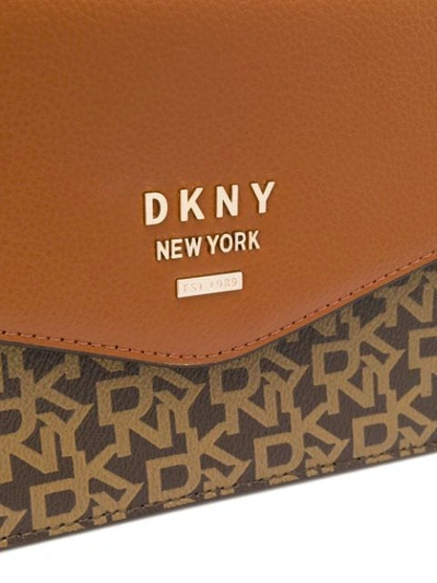Shop Dkny Repeat Logo Shoulder Bag In Brown
