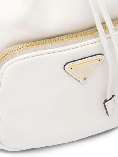 Shop Prada Logo Bucket Bag In White