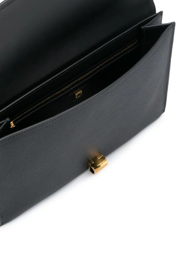 Shop Ferragamo Logo Buckle Clutch Bag In Black