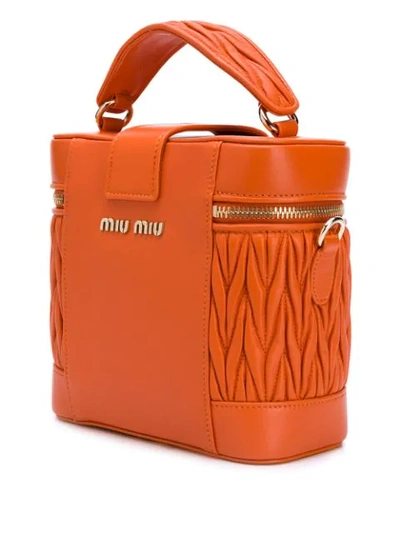 Shop Miu Miu Matelassé Round-shaped Tote In Orange