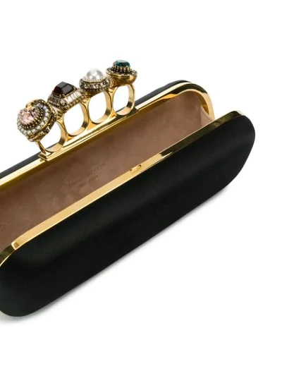 Shop Alexander Mcqueen Four Ring Clutch Bag In Black