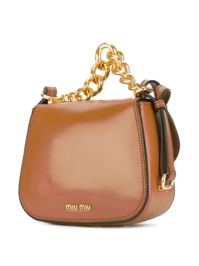 Shop Miu Miu Mini Buckled Shoulder Bag - Brown