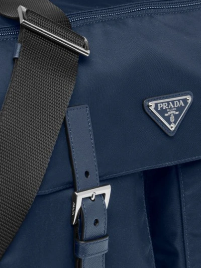 Shop Prada Buckled Shoulder Bag In Blue