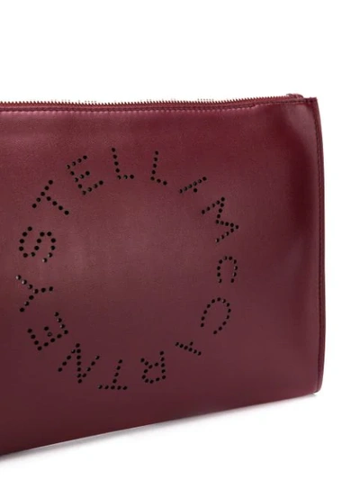 Shop Stella Mccartney Large Perforated-logo Clutch In Red