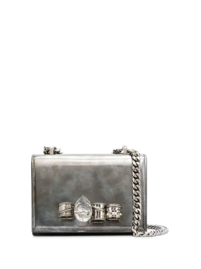 Shop Alexander Mcqueen Four-ring Clutch In 1407 Silver