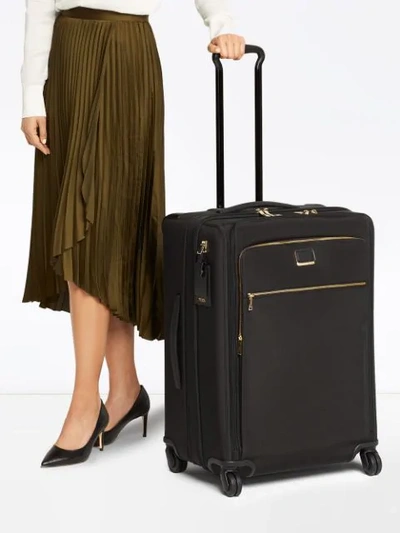 Shop Tumi Jordan Trolley In Black/gold