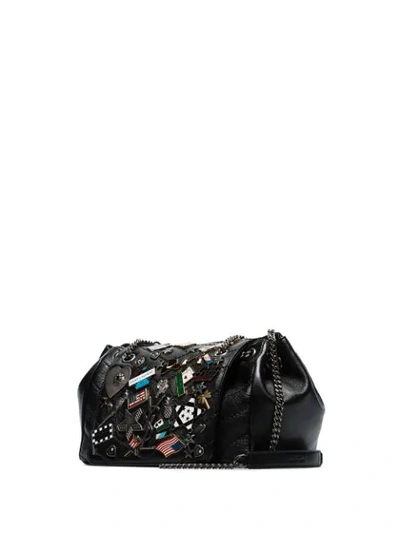 Shop Saint Laurent Nolita Small Badge Embellished Shoulder Bag In 1000 Black