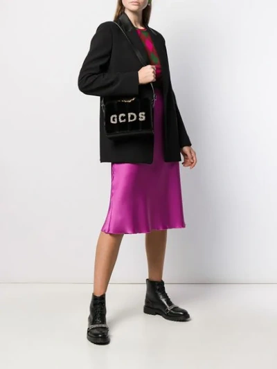 Shop Gcds Faux Fur Cross Body Bag In Black