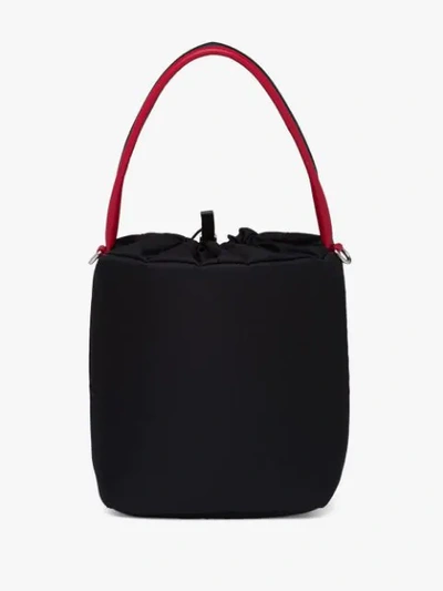 Shop Prada Logo Plaque Bucket Bag - Black