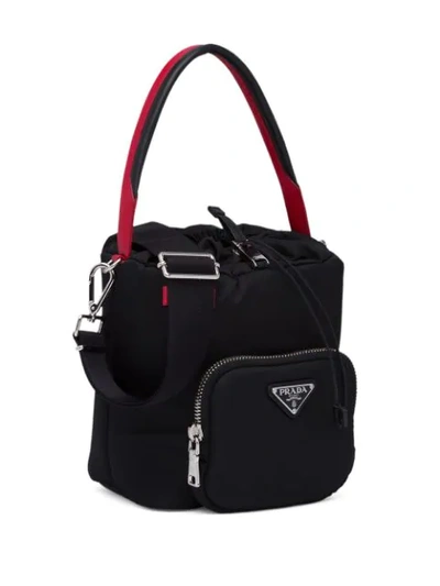 Shop Prada Logo Plaque Bucket Bag - Black