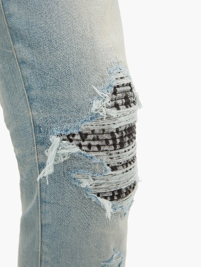 Amiri Mx1 Animal-insert Distressed Skinny-leg Jeans In Light Blue
