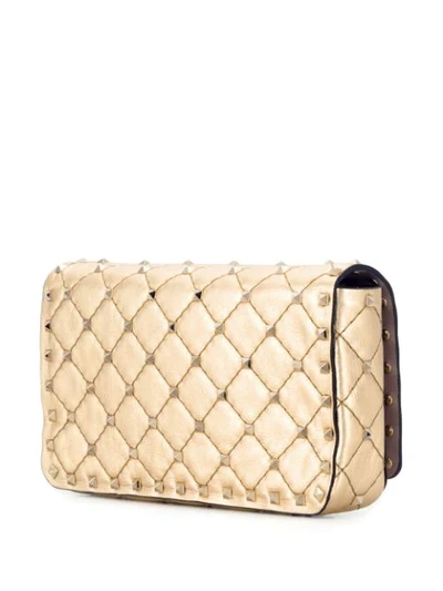 Shop Valentino Rockstud Spike Crossbody Bag In Gold