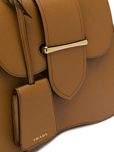 Shop Prada Handtasche Mit Schulterriemen In Brown