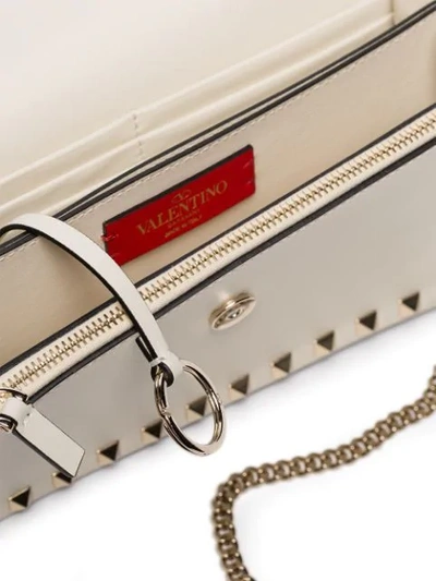 Shop Valentino Garavani Rockstud Clutch Bag In White