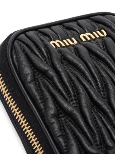 Shop Miu Miu Matelassé Leather Phone Case - Black