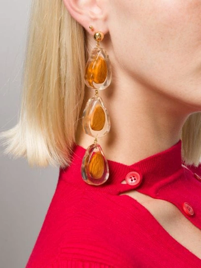 Shop Jacquemus Asymmetric Almond Earrings In Brown