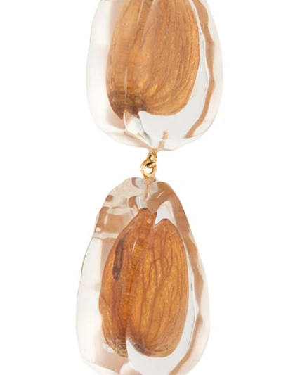 Shop Jacquemus Asymmetric Almond Earrings In Brown