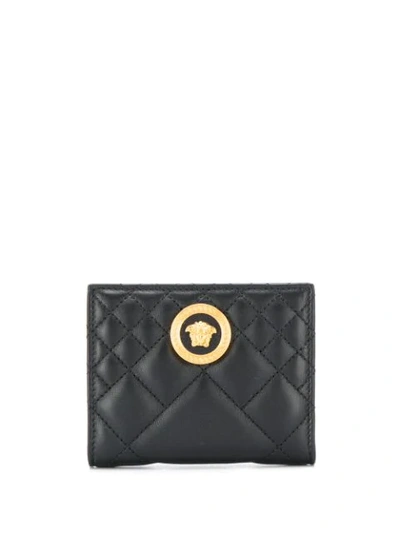 Shop Versace Quilted Medusa Purse In Black