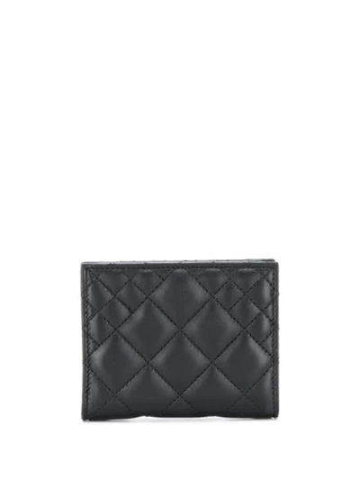 Shop Versace Quilted Medusa Purse In Black