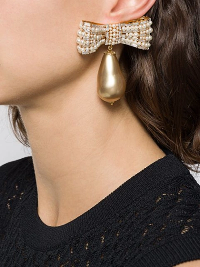 Shop Dolce & Gabbana Bow Drop Clip Earrings In Gold