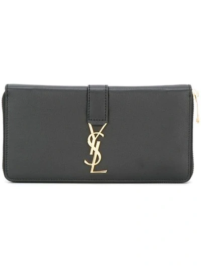 Shop Saint Laurent Ysl Zip Around Wallet In Black
