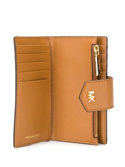 Shop Michael Michael Kors Textured Snap Wallet In Brown