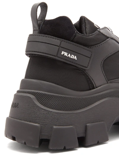 Shop Prada Pegasus Leather Trainers In Black