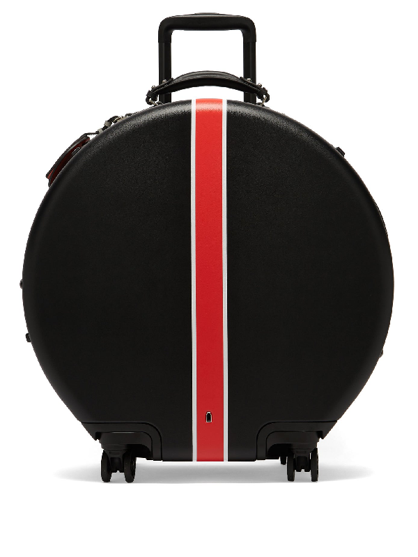 red and black suitcase