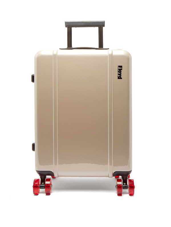 cream suitcase