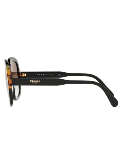 Shop Prada Heritage Round Frame Sunglasses In Black