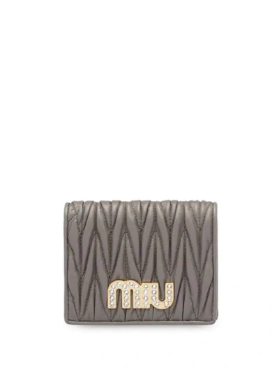 Shop Miu Miu Matelassé Embellished Logo Wallet In Grey