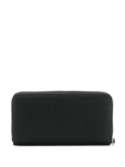 Shop Armani Exchange Monogram Zipped Wallet In Black