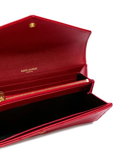 Shop Saint Laurent Monogram Envelope Wallet In Red